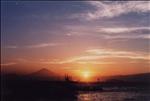 真名瀬海岸から夕日を望む写真